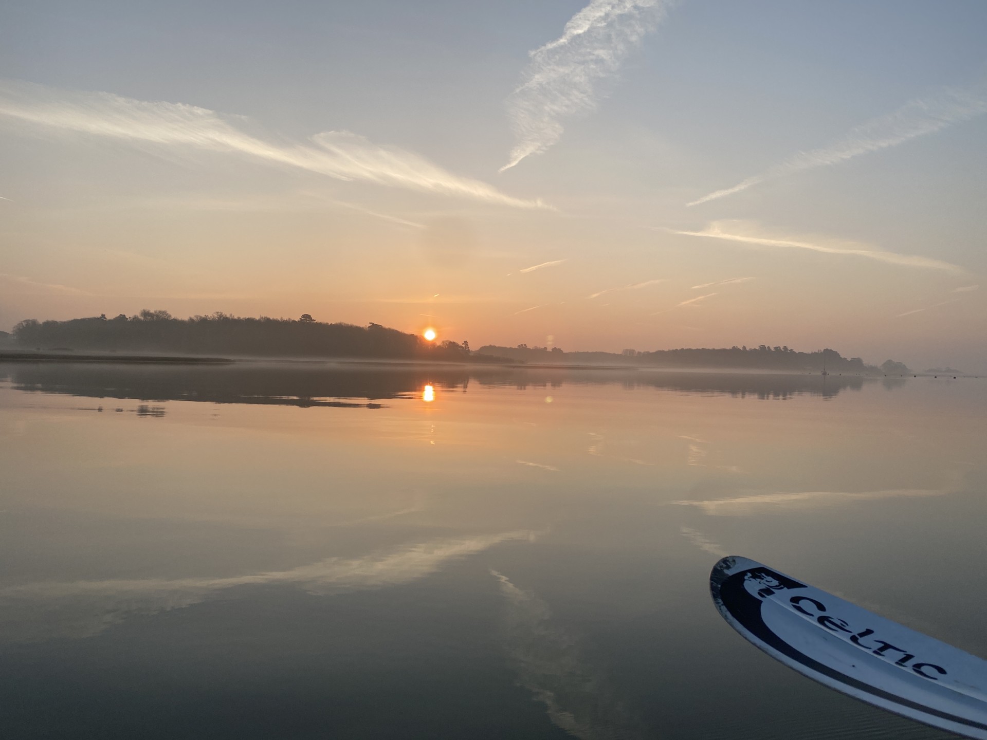 Flat calm seas with NOMAD Sea Kayaking.