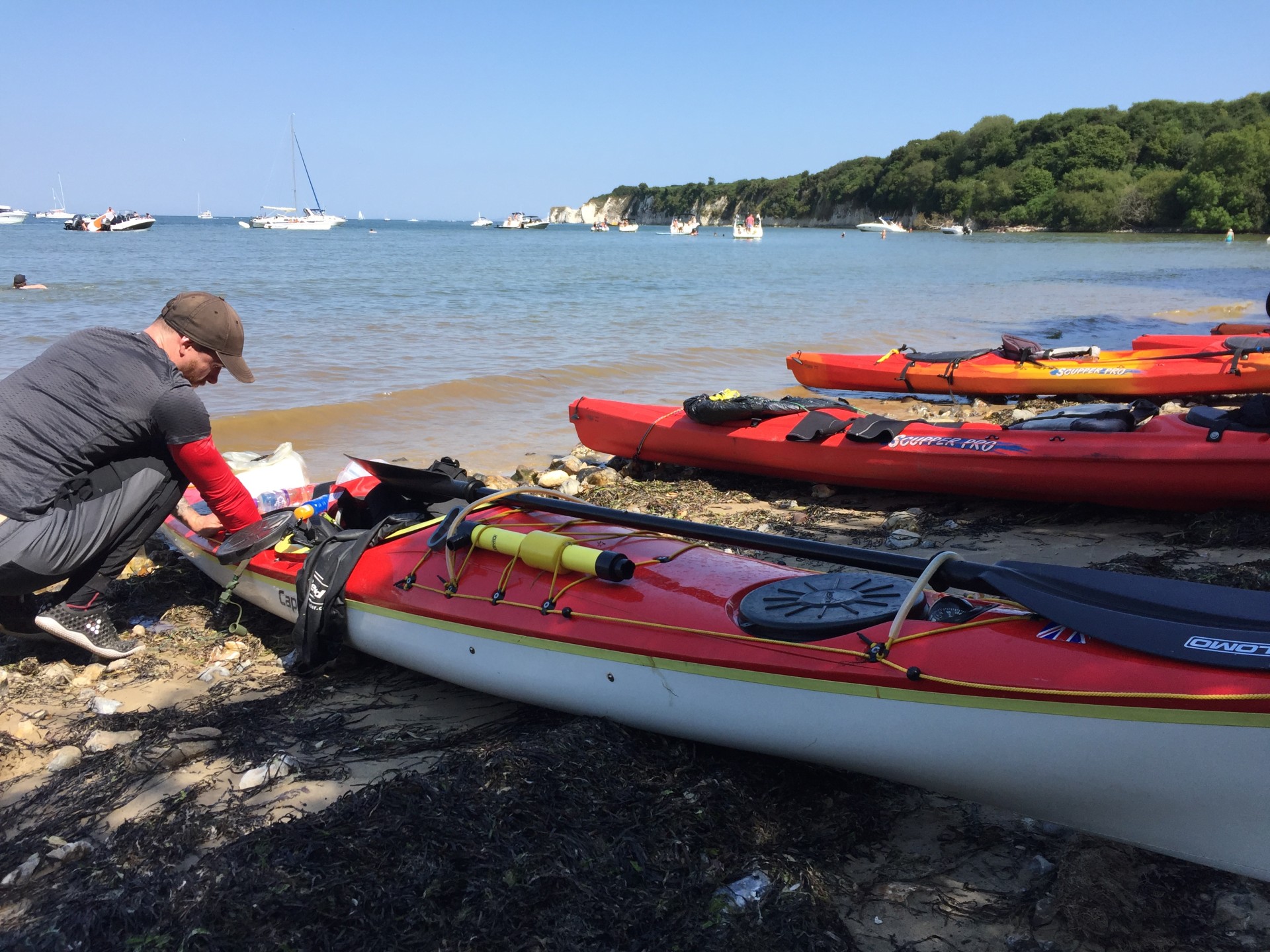 Studland Bay on a sunny, warm day with NOMAD Sea Kayaking.