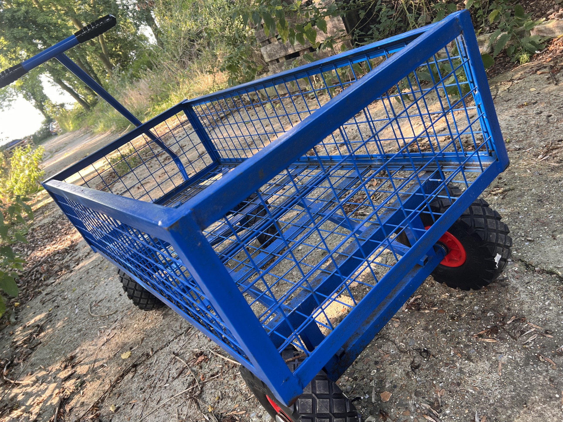 Welded metal heavy duty garden trolley.