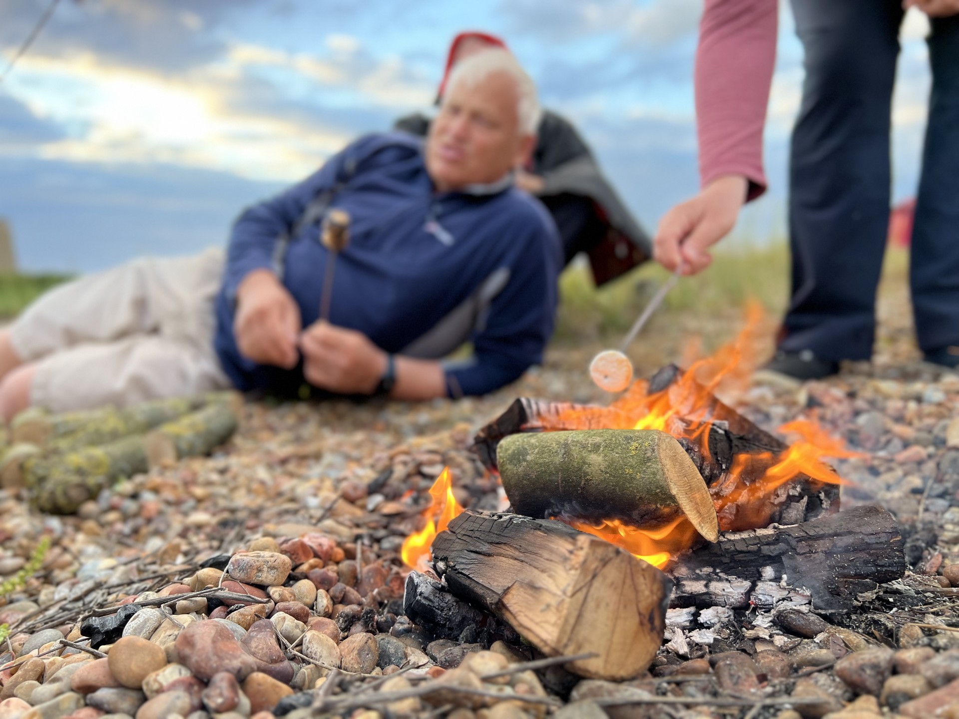 Open, wood fires wild camping with NOMAD Sea Kayaking.