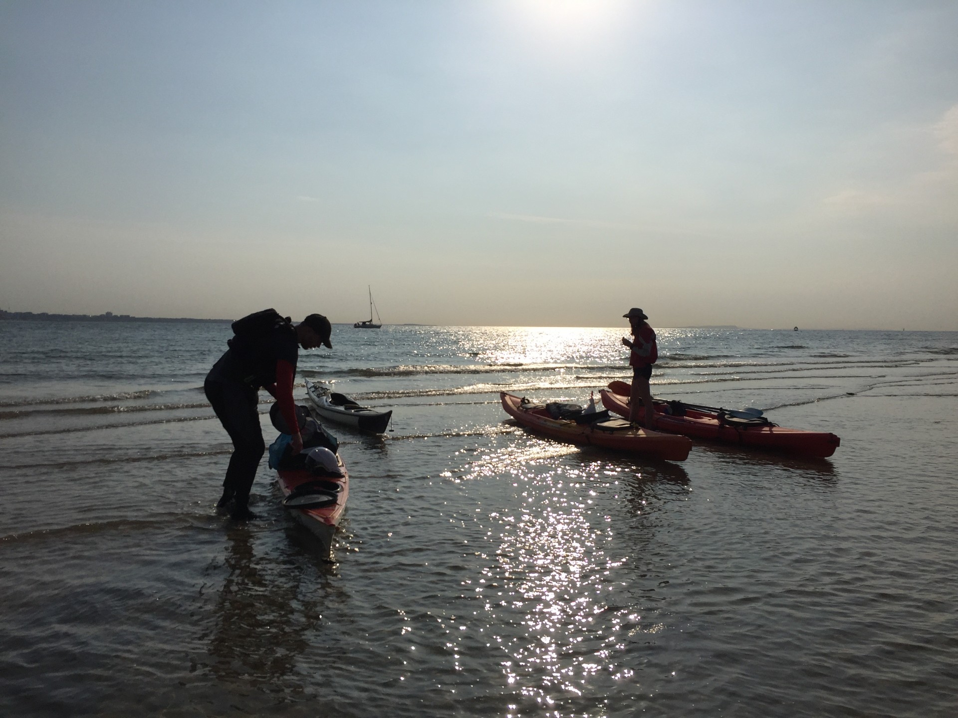 Landing on a beach near Studland with NOMAD Sea Kayaking.