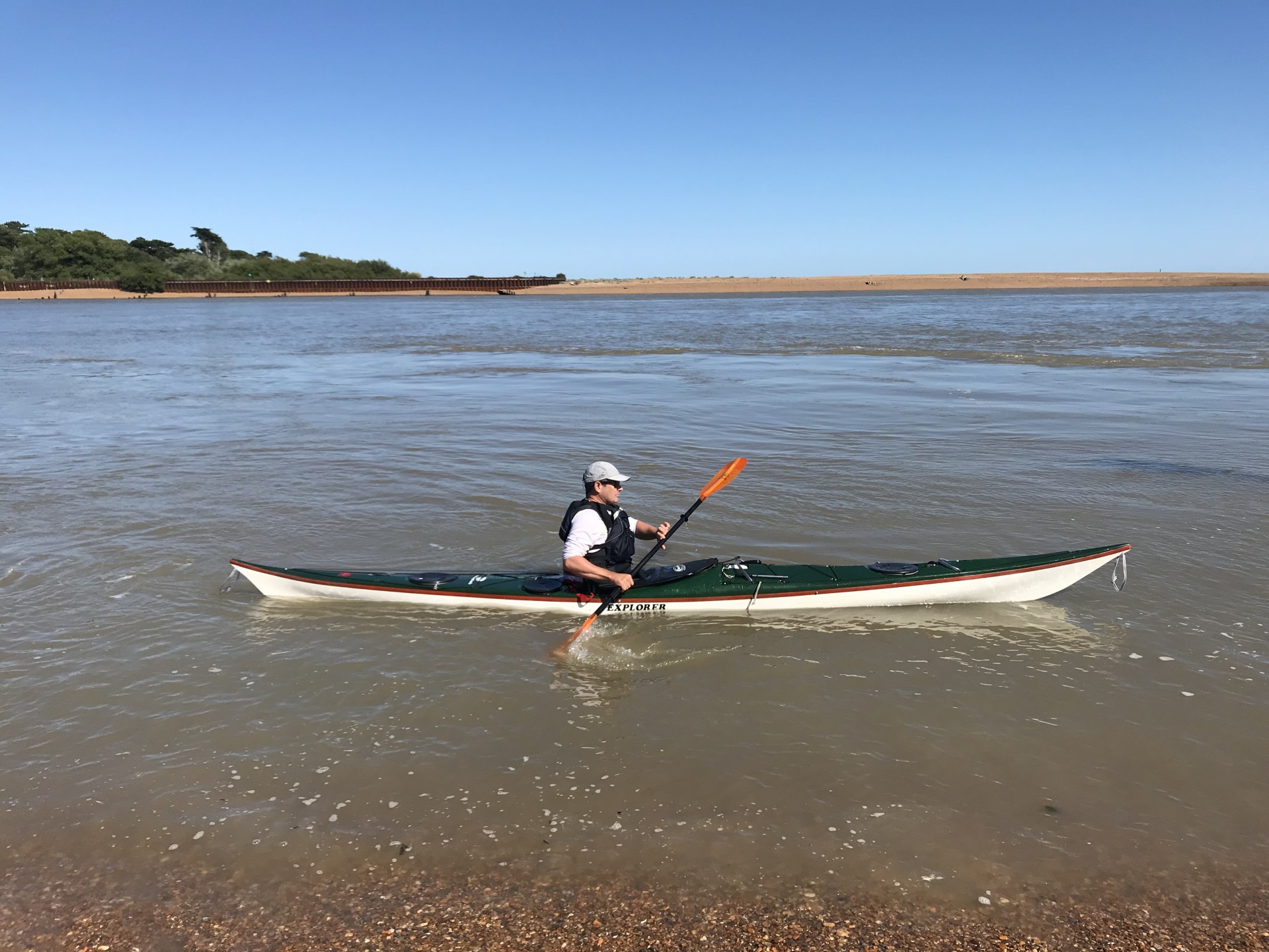 Sunny skies and flat seas for sea kayaking with NOMAD Sea Kayaking.