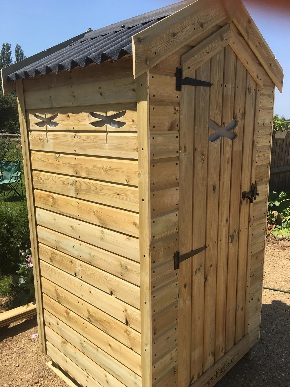 Purpose built composting toilet at Hollyhocks luxury glamping site in Suffolk.