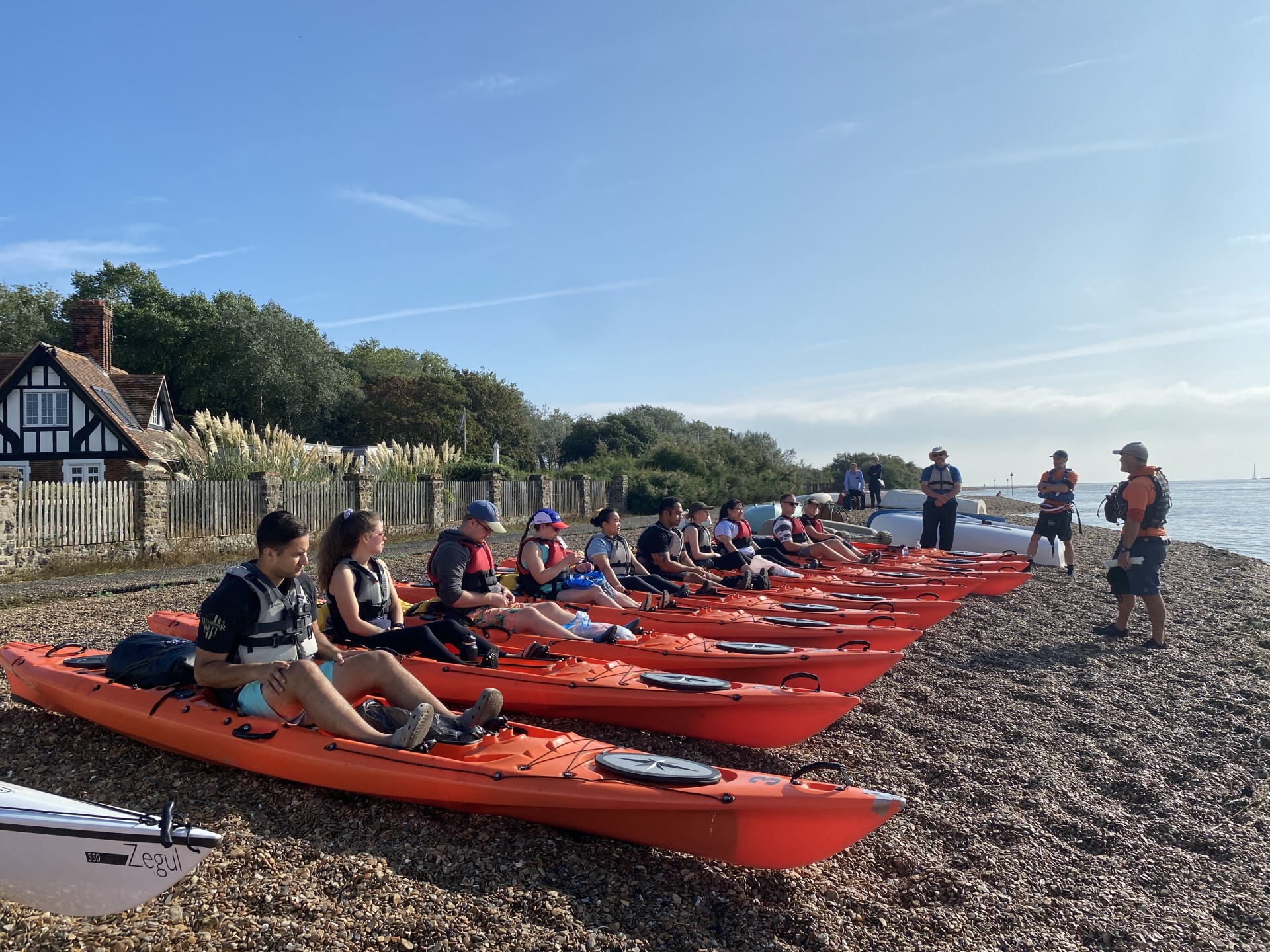 Safety briefing before launching with NOMAD Sea Kayaking.