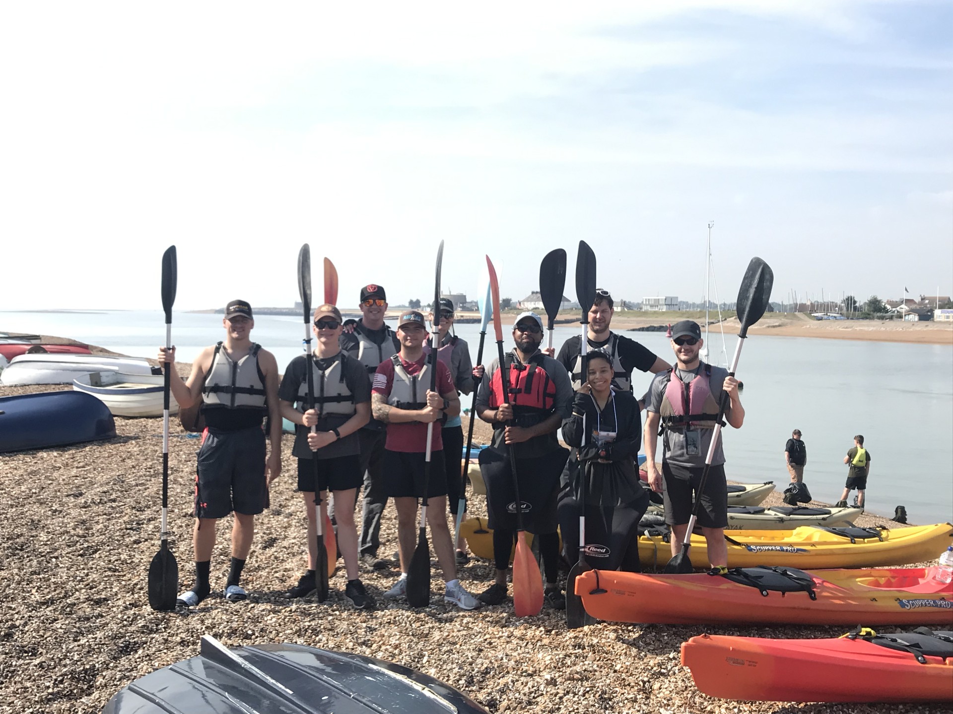 Sea kayaking group before launching with NOMAD Sea Kayaking.