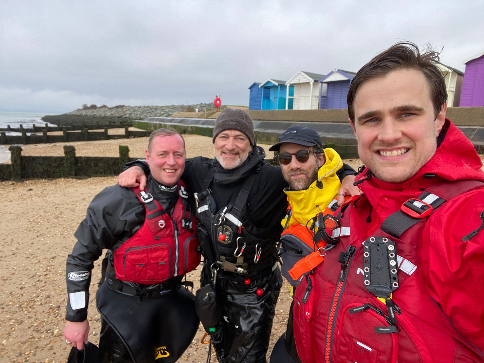 Happy sea kayakers in Suffolk with NOMAD Sea Kayaking.