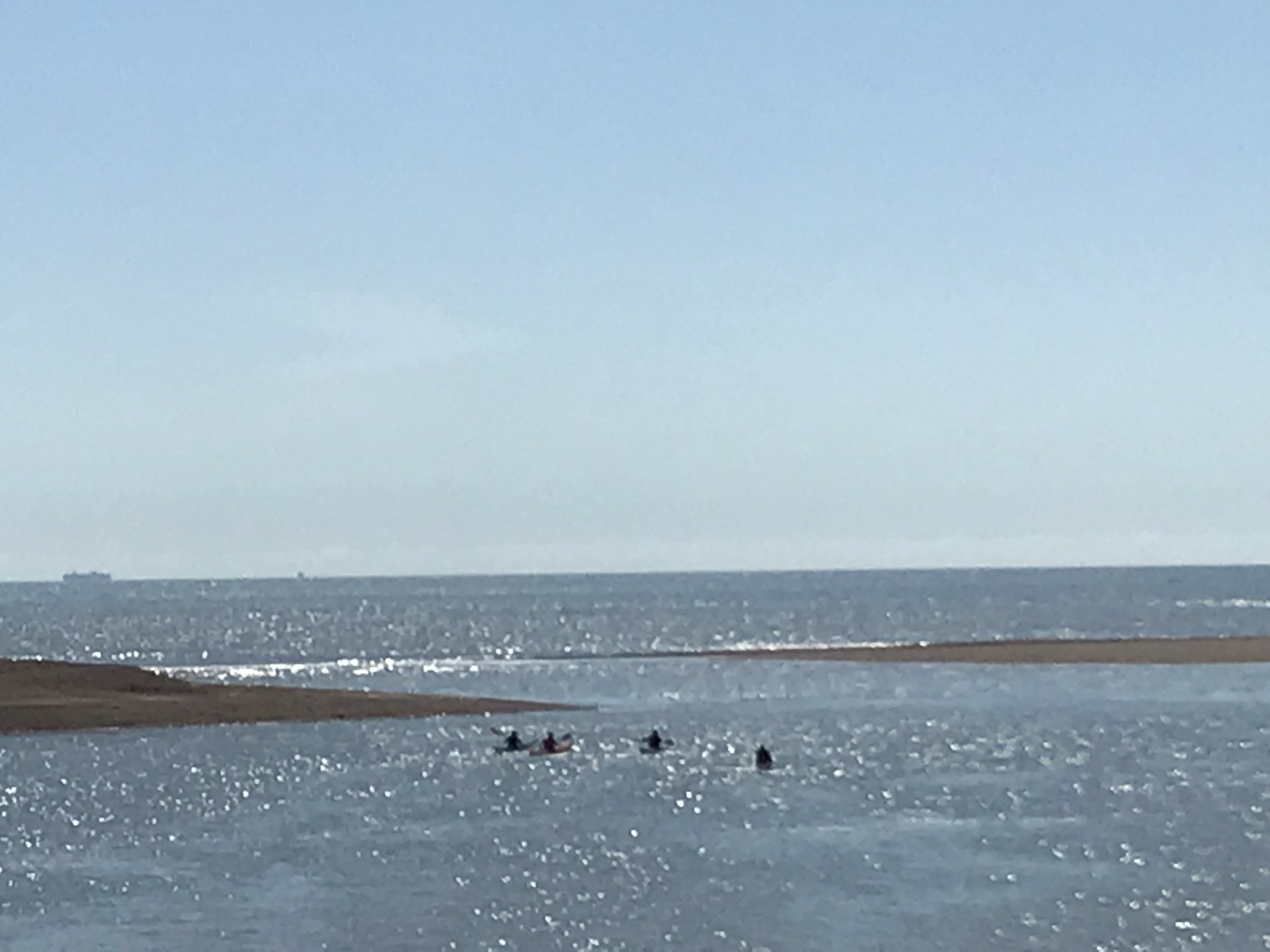 Paddling out and over the shoals at the Deben mouth with NOMAD Sea Kayaking.